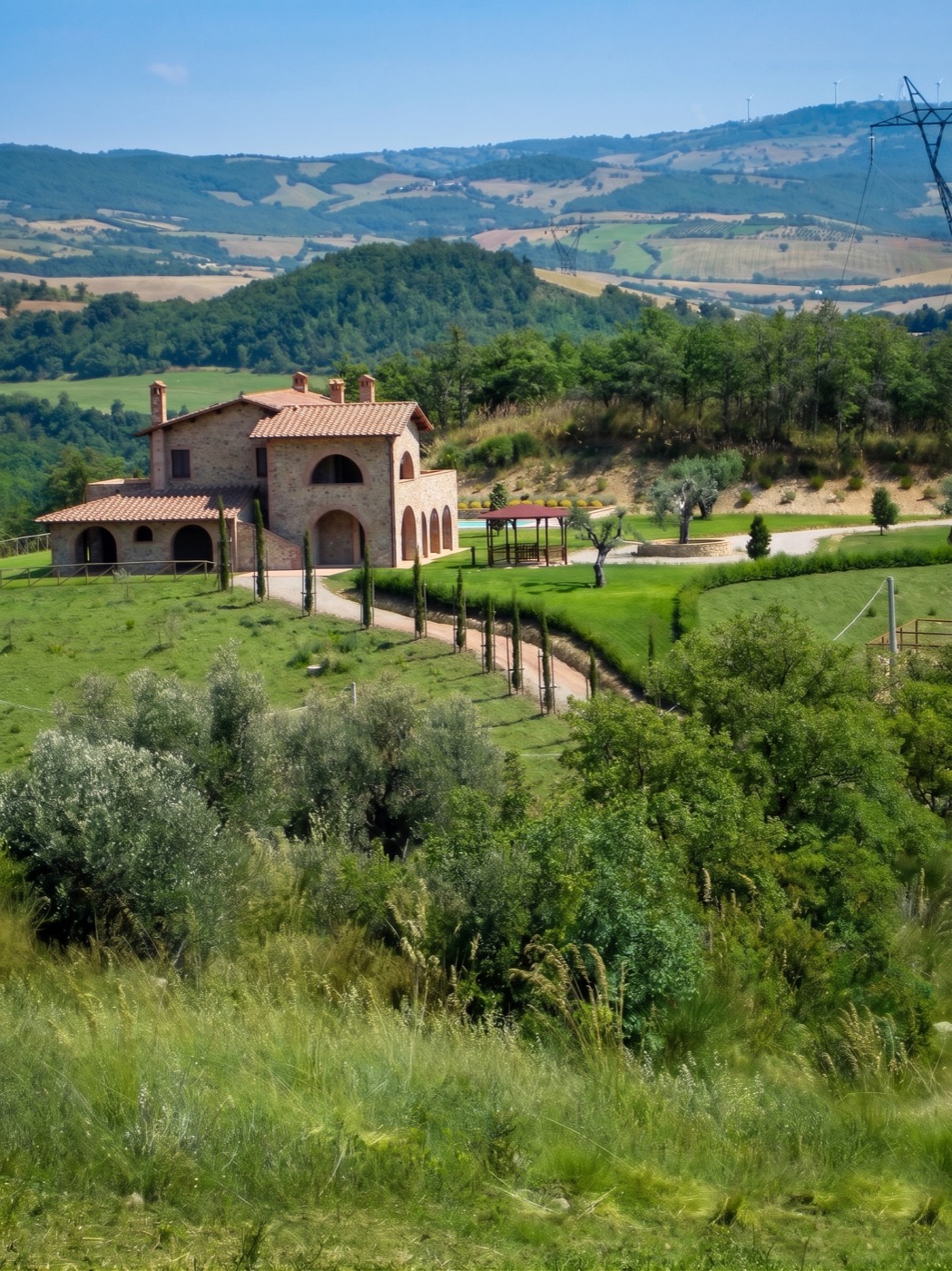 The casale on its hill above the olive terraces